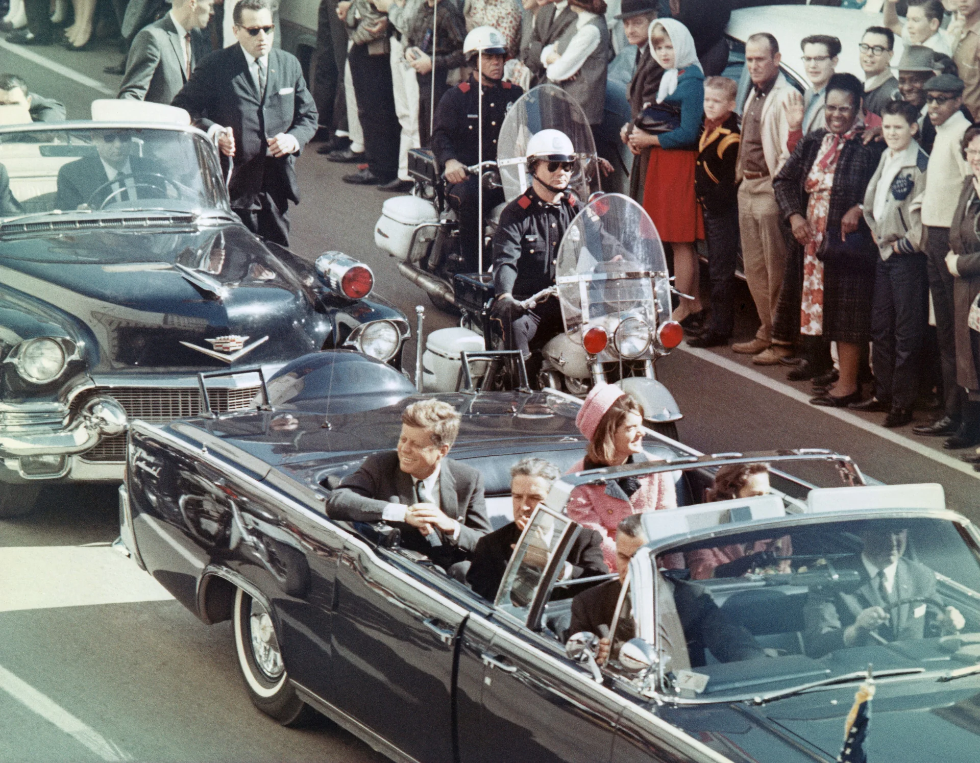 Iconic JFK motorcade image in Dealey Plaza