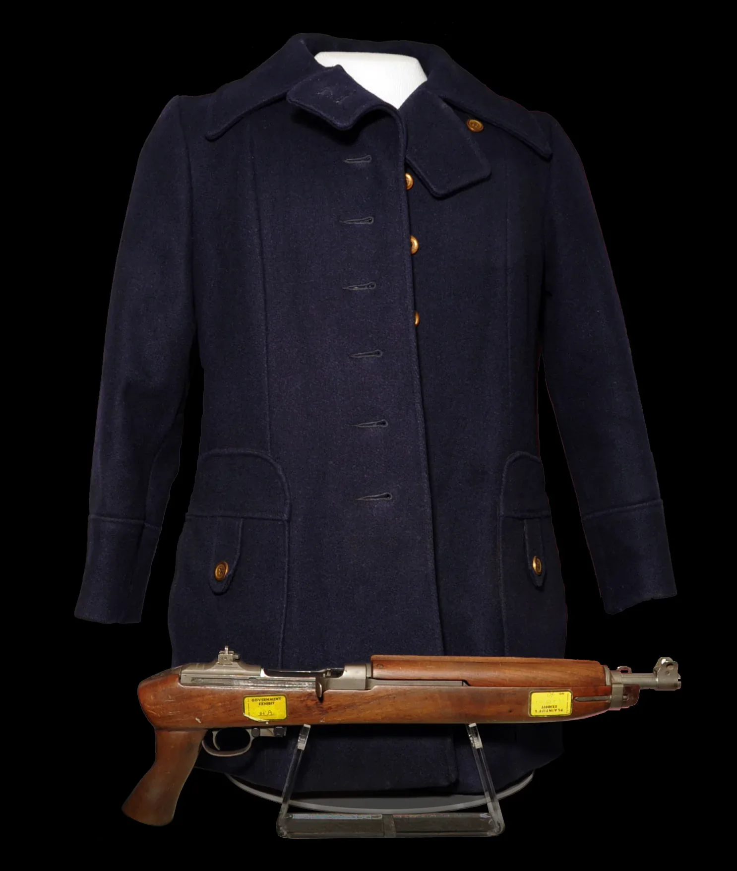 Coat and firearm preserved in the FBI collection