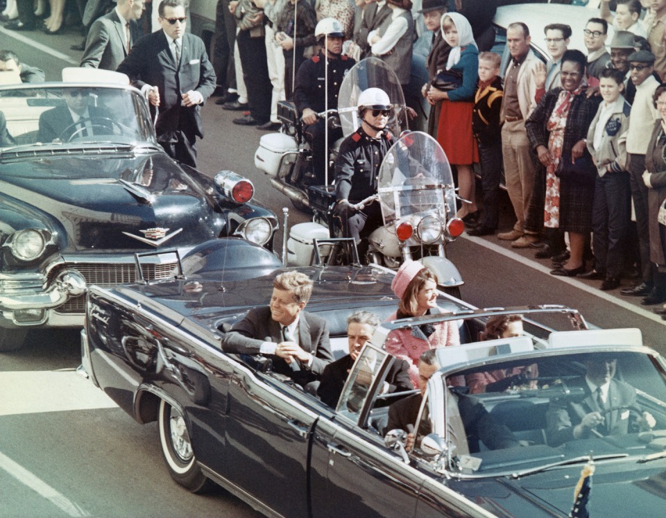 Iconic JFK motorcade image in Dealey Plaza